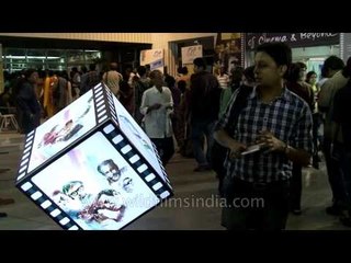 Winding film reels at Kolkata International Film Festival