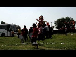 Devotees paying homage to Lord Ganesh on last day of Ganesh Chaturthi