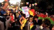 Gay supporters hold placards with slogans on the march