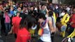 Gay participants dancing in the streets: Delhi Queer Pride