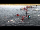 Hindus splash and swim in river to celebrate Ganesh Chaturthi
