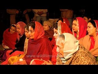 Ritual being performed by priest for newly wedded royal couple of Jubbal