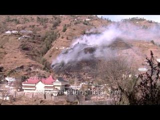 Fire on a hill behind Jubbal Palace