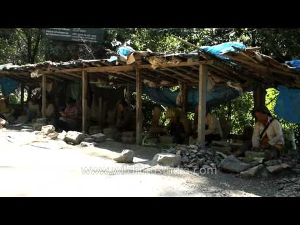 Villagers in Baktwang village breaking stones f...