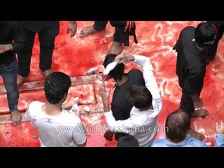 Everyone taking first aid after Muharram procession