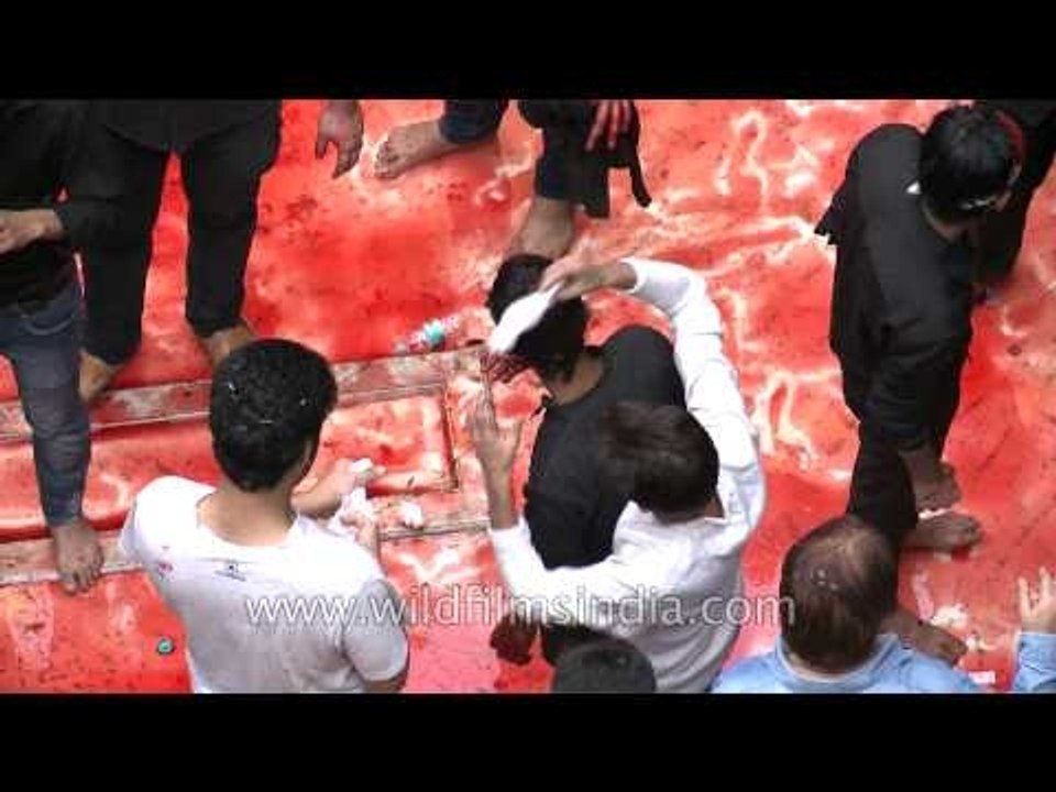 Everyone taking first aid after Muharram procession
