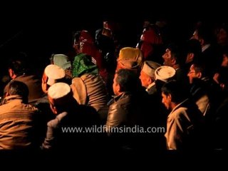 Himachalis look on as the gods come avisiting Jubbal town!