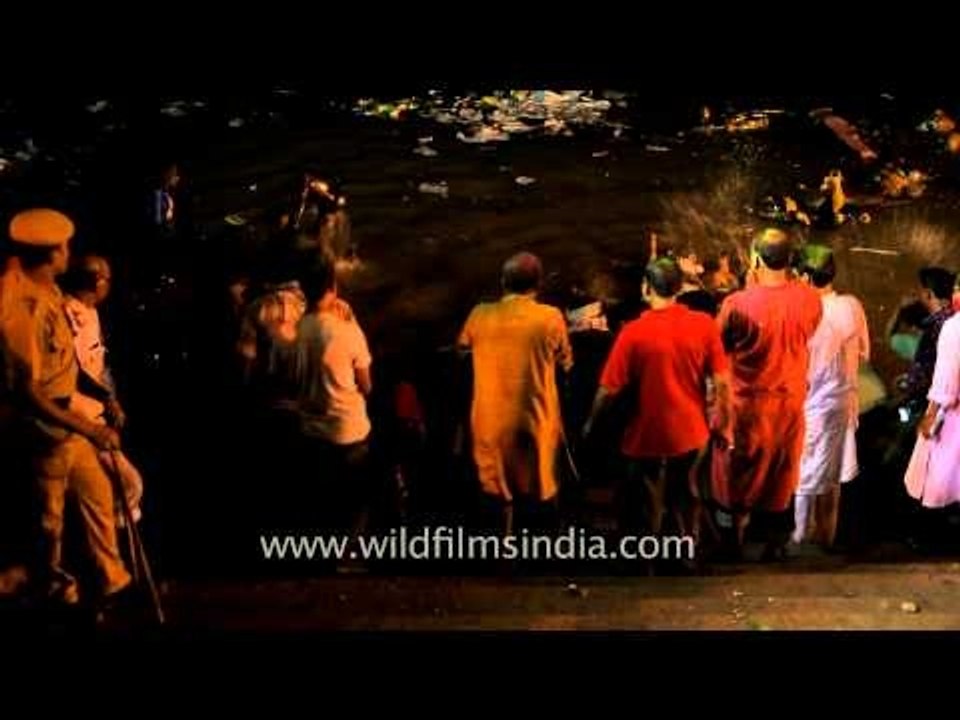 Deep in Ganga: Immersion of Durga idol in Ganga; Kolkata Durga puja