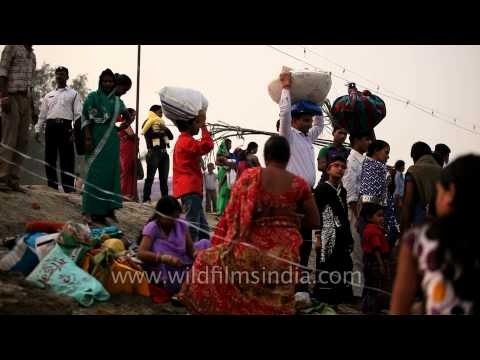 Devotees throng a ghat on river Yamuna to worship Sun God on' Chhath Puja' in Delhi