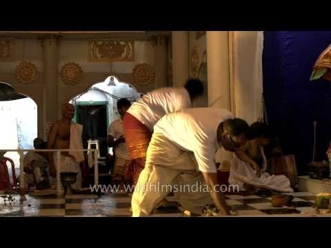 Devotees offering prayers to Maa Durga