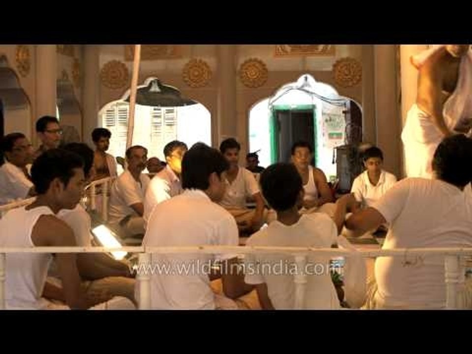 Offering Pushpanjali to Maa Durga