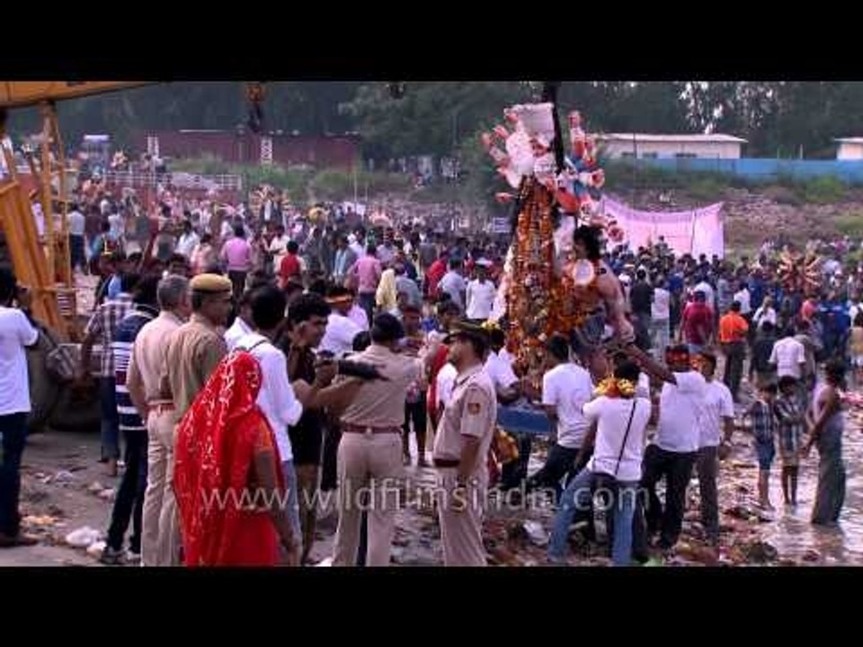 Devotees carrying the "Durga Idol" for immersion in the river Yamuna