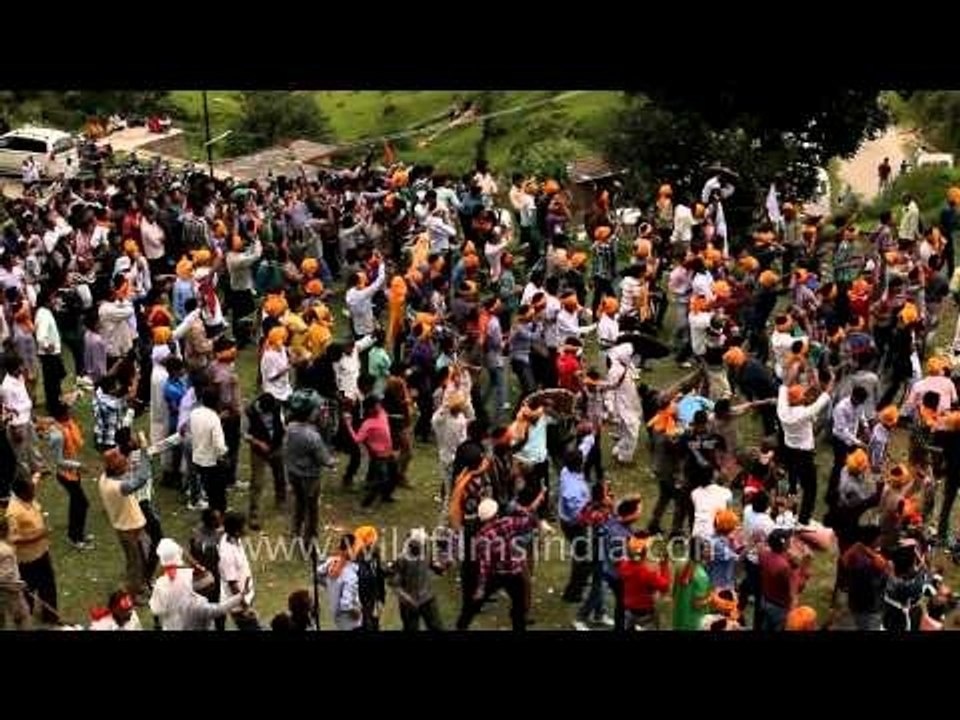 Blood offering to the Goddess by throwing stones on each other of two groups
