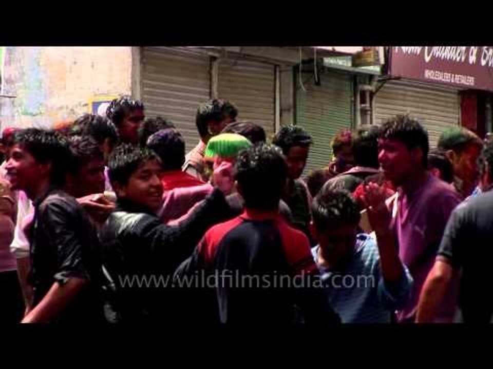 People dancing on Bollywood numbers during Holy...