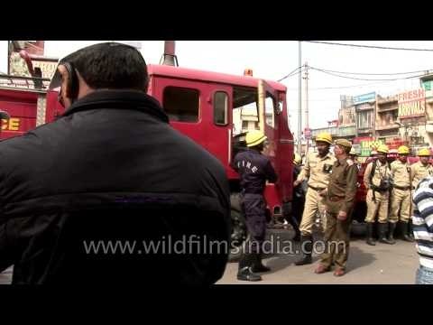 Delhi police and fire fighters gathered at Central Market in Lajpat Nagar