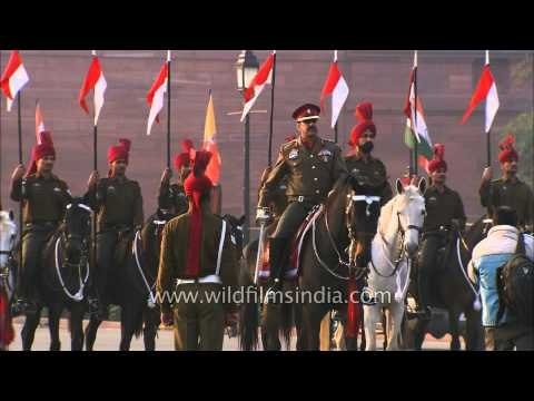 Bodyguards mounted on horses come forward at Rashtrapati Bhawan