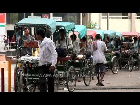 Rickshaw pullers standing in queue to pick up passengers