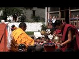 Monks performing the religious rituals during the ceremony in Bumthang, Bhutan