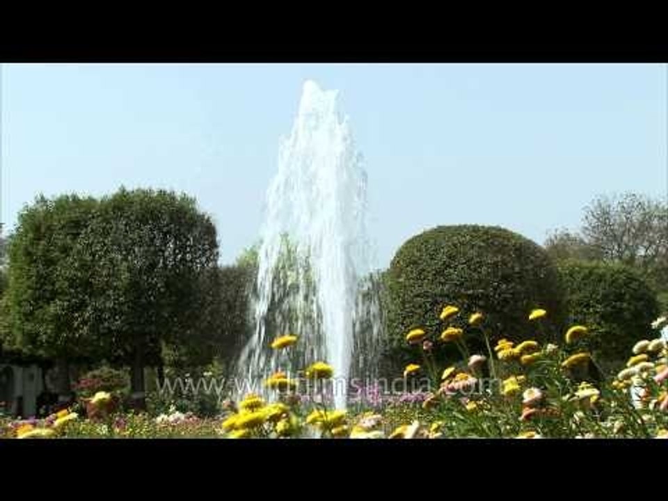 High fountain and beautiful flowers at the President estate, Mughal garden