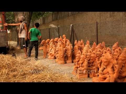 Terracotta Lord Ganesha statue at a pottery shop in Sarojini Nagar, Delhi