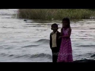 Children enjoying the riverside