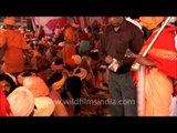 Hindu sadhus being honored by Dakshina during Samashti Bhandara, Maha Shivratri at Varanasi