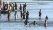 Devotees taking holy dip in Ganga during Maha Shivratri at Maha Kumbh
