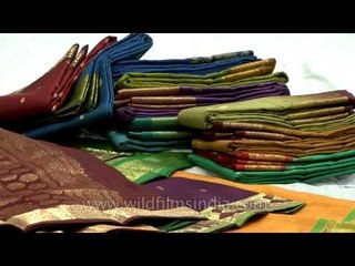 Kanchipuram sarees decorated with embroidery work of golden zari