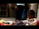 Young Indian fruit seller - Child Labor ruins lives