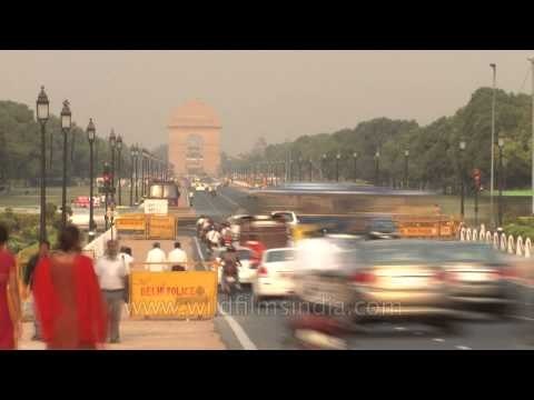 Fast motion traffic of Delhi from day to night, at India Gate