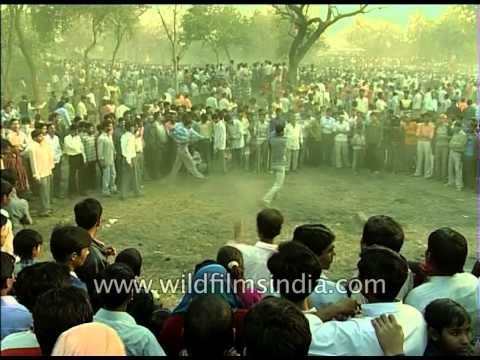 Local street performer plays with fire