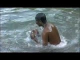 Splashing around in a cool river in Kerala's summer heat