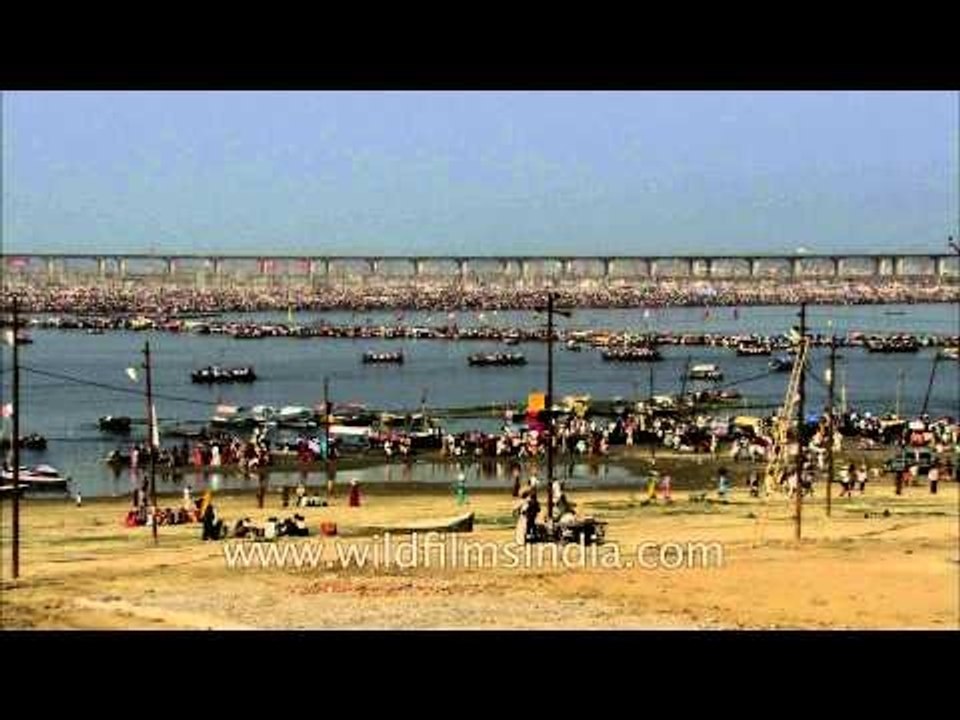 Hundred million Hindu devotees symbolically bathe away their sins in the holy Ganges River
