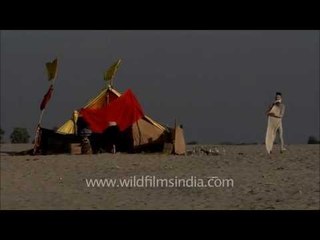 Cinema verite on Varanasi Ghat: sadhu does a strip tease!