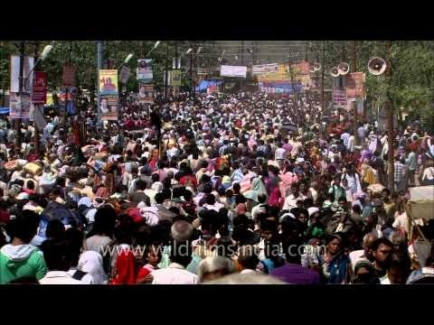 Devotees going towards the river bed in Maha Kumbh Mela