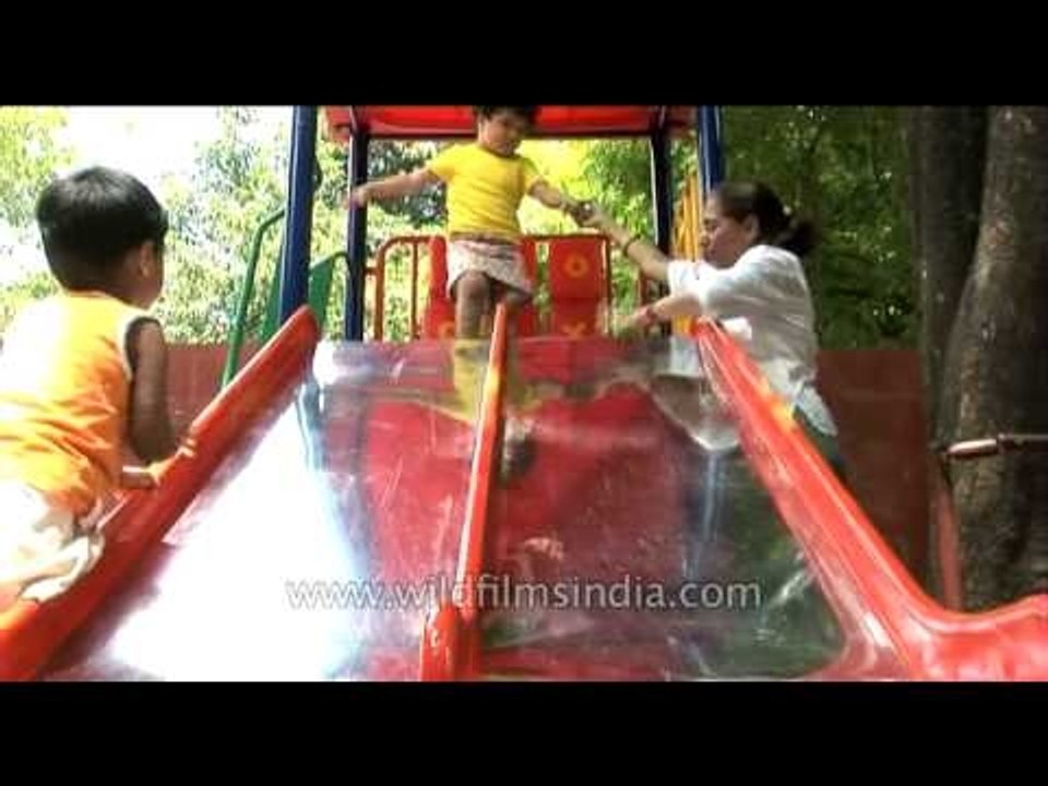 Kids playing on the slide