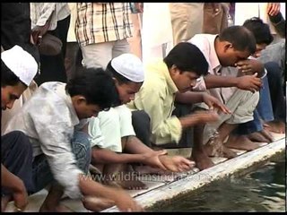 Men performing 'Wazu' before namaz at Jama Masjid