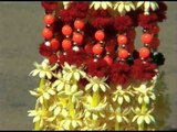Garlands made of plastic flowers