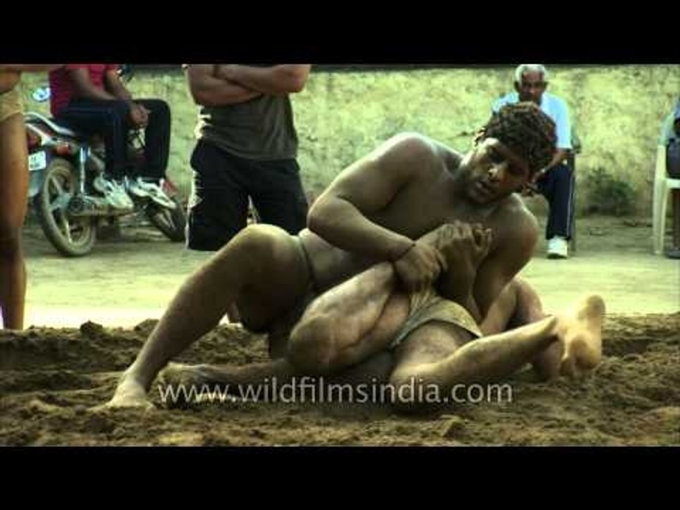 Wrestling in mud
