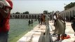 Devotees taking a holy dip on Baisakhi at the sarovar in Gurudwara Takht Sri Kesgarh Sahib