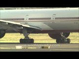 Air India plane taxis on runway - see how many tyres it has!