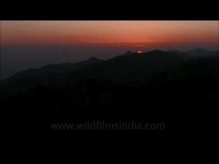 Sun sets behind Benog and Bhadraj, as seen from Landour
