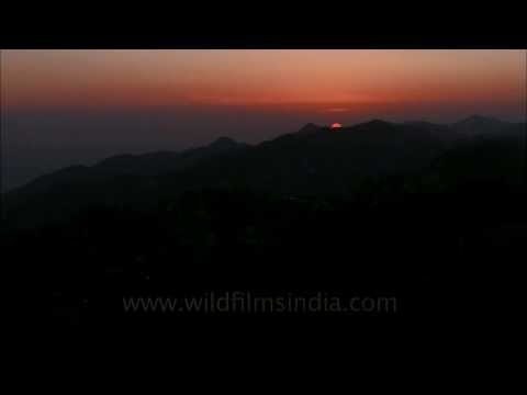 Sun sets behind Benog and Bhadraj, as seen from Landour