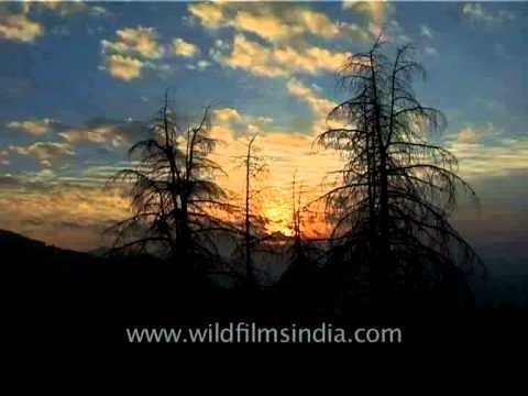Clouds moving fast over mountains in the Western Himalayas of Uttaranchal in North India