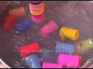 Sikh devotees washing glasses during Shaheedi Divas- Kar Seva