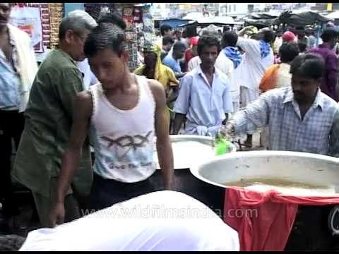 Free unhygienic lemonade for devotees of Lord Jagannath at the peak of Hot Indian summer