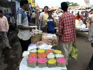 Prasad in many colors being sold outside the Jagannath Temple in Puri, Orissa