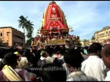 Rath Yatra : Devotees throng around the chariots as they wait to pull them
