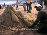 Sculpting out of sand in Puri Beach, Odisha