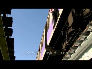 Dangerous - People hanging out of local trains in Mumbai